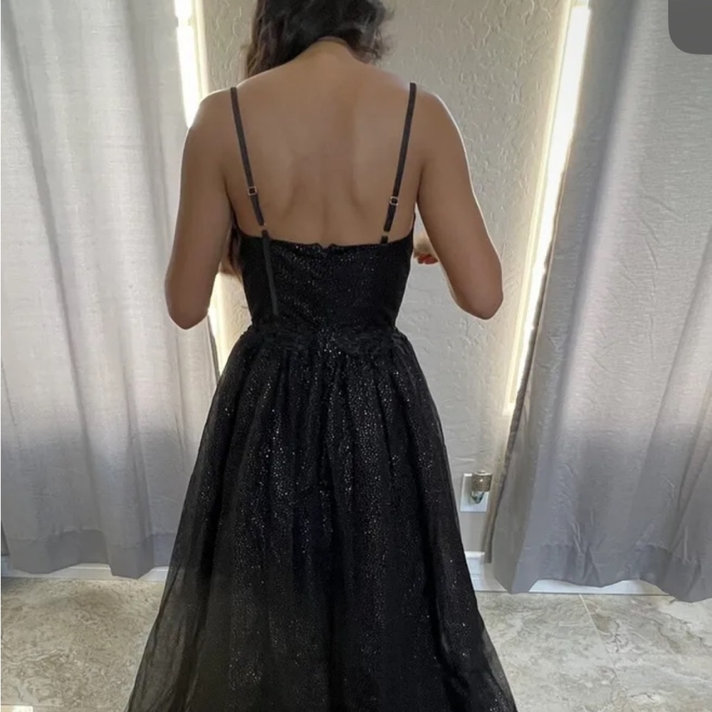 Elegant black and silver prom dress.